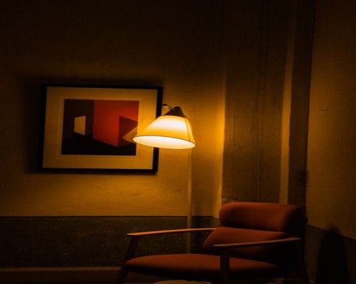 Cozy reading space with warm lamp light